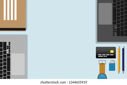 Top down flat view of table  with laptop, mobilephone, credit card,tablet,watch, pencil,rubble and copy space for text