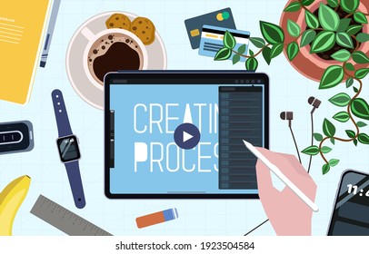 Top down view graphic workplace. Ux ui designer at work in front of a table top view. Drawing on a tablet with cup of coffee, flower in a pot, smart watches, bank cards and graphic controller. Vector.