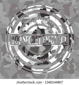 Top Secret Evidence on grey camouflaged texture