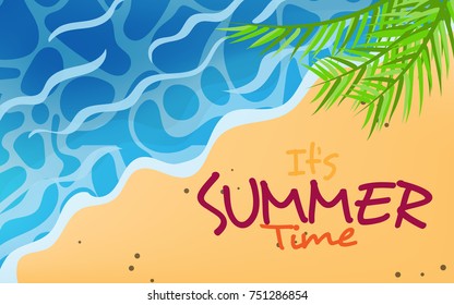 Top view above the sand beach with sea, waves, coconut leaves and with text in the copy space "It's Summer Time"