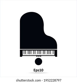 Top view of black grand piano on white background