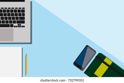 Top view of the business desk with laptop, empty paper work, mobile phone, pencil and notebook with copy space for your text 