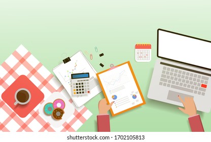 Top view of business desk in workplace with morning light. Pink tablecloth with laptop, calculator, document paperwork, cup of coffee, smart phone.  Work from home concept.