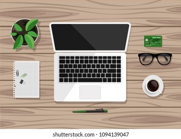 Top view of business workplace on wood desk. Flat design of workspace with laptop, notebook, cup of coffee, pot of plant, eyeglasses etc. Vector illustration.