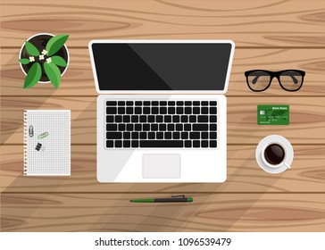 Top view of business workplace on wood desk. Flat design of workspace with laptop, notebook, cup of coffee, pot of plant, eyeglasses etc. Vector illustration.