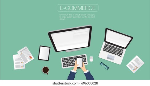 Top view Businessman's hands using smartphone , laptop and digital tablet on green background.