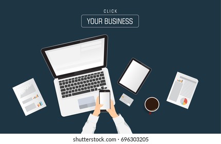 Top view Businessman's hands using smartphone , laptop and digital tablet on blue background.