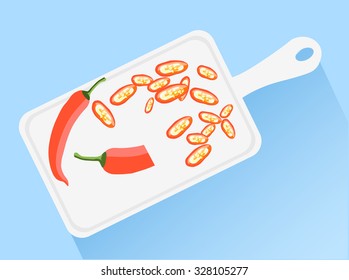 Top view chopping board with vegetables. Healthy vegetarian food. Chopped chili pepper on the chopping board. Can be used for website banners