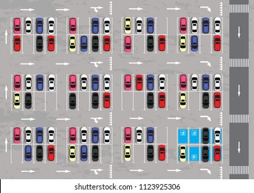 Top view of a city parking lot with a set of different cars.