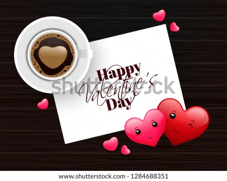 Top view of coffee cup with valentine's day greeting card design on background.