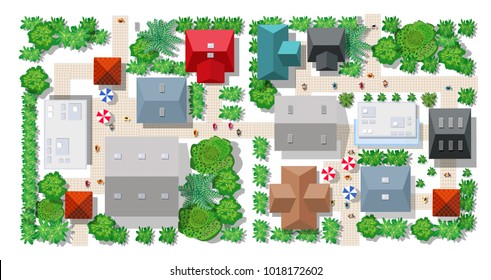 Top view of the colorful city with a road with roofs of houses, streets and trees