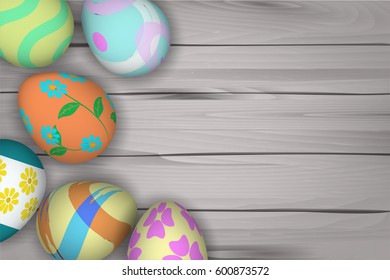 top view of colorful Easter eggs on wooden background with blank space.Template for Easter season greeting card, banner and poster in vector illustration to celebrate the festival.