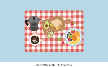 Top view of a cozy picnic arrangement with delicious breakfast sandwiches, fresh fruit, coffee, and moka pot.