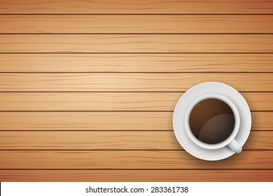 Top view of cup of coffee or tea on the table light wood with space for text