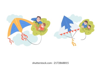 Top view of dad and son launching kites in park set cartoon vector illustration