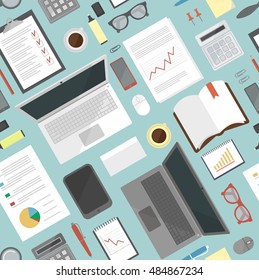 Top view of desk background with laptop, digital devices, office objects with papers and documents.