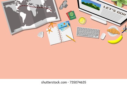 Top view of desk of traveler with computer and empty notebook planing for the next trip, world's map, also croissant and banana for breakfast with copy space for your own text 
