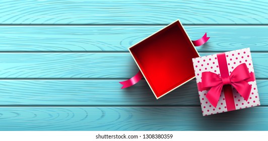 Top view of empty open gift box for Valentine's Day on wood background.Promotion and shopping template or background for Love and Valentine's day concept.Vector illustration EPS10