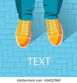 Top view of feet in sport boots and jeans.Vector illustration for text