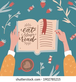 Top view female hands holding an open book. Table with Cup of coffee , flowers, branches and sweeties.. Cozy spring concept in flat cartoon style. Eat, sleep, read - lettering quote.