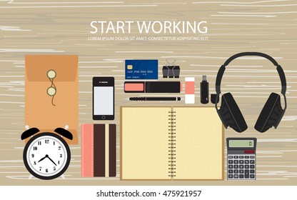 Top view of flat web banner design with credit card, earphone, pencil and clock on brown wooden background
