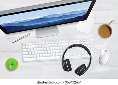 Top view of keyboard, digital screen, notepad and other accessories on white wooden table