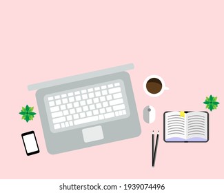 Top View laptop Computer , Mobile Phone , Diary ,pencil ,plant and A cup of Coffee on Pink Color Background with copy space.Business,work from home,Technology,Marketing Online,Education Concept