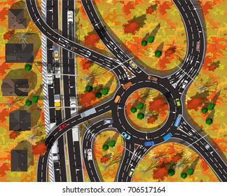 top view large circle automobile highway in the city in autumn with gold leaves