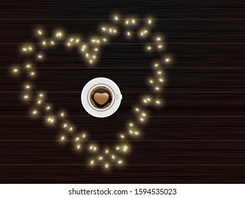 Top View of Latte Art Love Coffee Cup on Heart Shape Made by Lighting Garland with Brown Wooden Texture Background.