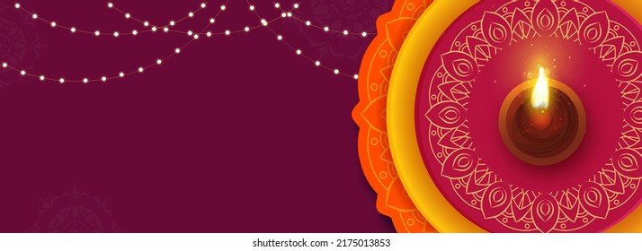 Top View Of Lit Oil Lamp (Diya) Against Circular Frame And Lighting Garland Decorated On Dark Pink Background With Copy Space.