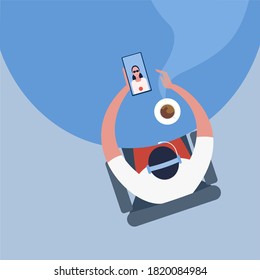 Top view of a man communicating through a mobile phone