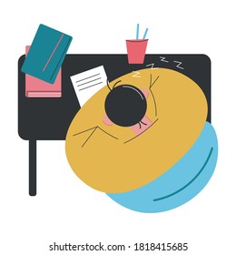 Top view of man sitting at desk during homework and sleeping