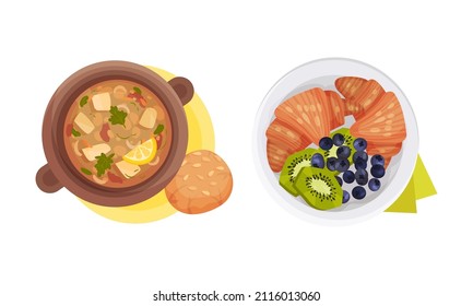 Top view of meal served on plates set. Soup, croissant with fruit and berries vector illustration
