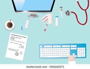 Top view of a medical table with accessories. Finger is touching computer keyboard.