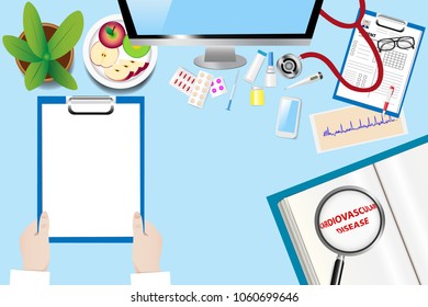 Top view of a medical table with doctor accessories. Doctor is holding blank paper ready for your text. The magnifying glass magnifies the inscription Cardiovascular disease in an open book.