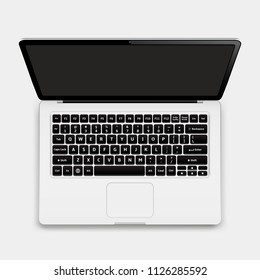 Top view of modern laptop with English keyboard isolated on white background