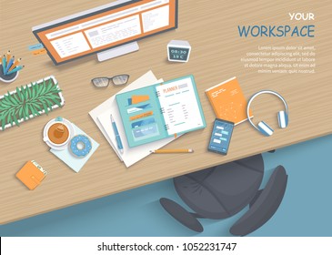 Top view of modern and stylish workplace. Wooden table, armchair, office supplies, monitor, books, notebook, headphones, phone, glasses, pen, paper, tea, donuts. Vector illustration