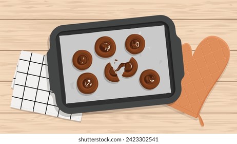 Top view of. thumbprint chocolate cookies on baking pan on wooden table  