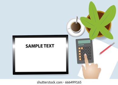 Top view of the office desk with coffee cup, plant in the pot and blank paper with pen. Hand is touching calculator. Blank tablet in is ready for your text.