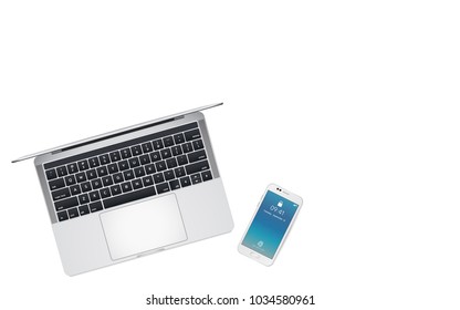 Top view of office desk with laptop and smartphone with lock screen content.Isolate on white background with copy space.