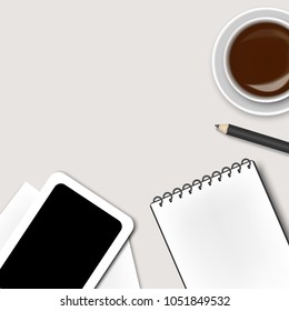 top view office table with Notepad and Tablet,cup of  coffee,pencil ,paper and smartphone, business concept design