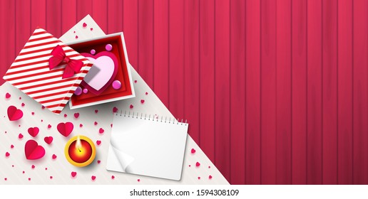Top view on gift box with wooden backdrop.Happy Valentine's Day concept. love iconic, ideas for gift, art, design, decoration.