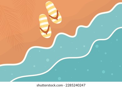 Top view on ocean beach with flippers on the coast