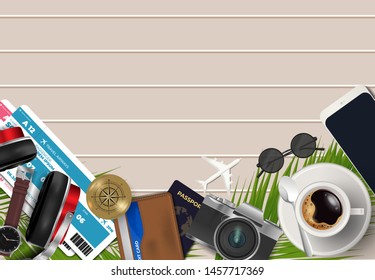 Top view on travel and vacations concept over wooden background