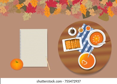 Top view on the wooden table with pumpkin menu.  Next to the table is blank notepad ready for your text. The top edge of the vector is ribbed with colorful autumnal leaves.