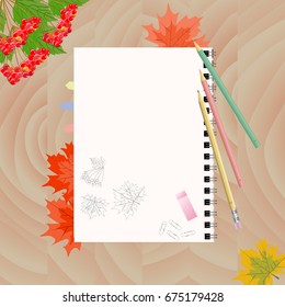 Top view of open notepad with pencils on wooden background. Flat design template of office workspace with open sketchbook and stationery. Autumn leaves and viburnum branch. Vector Illustration
