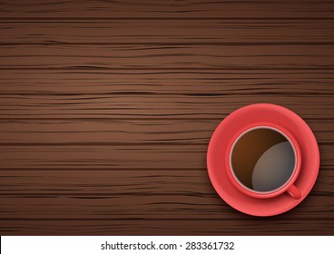 Top view of red cup of coffee or tea on the table dark wood with space for text