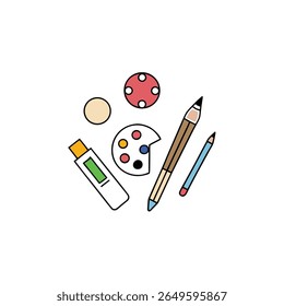 top view of scattered art supplies brushes colors