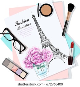 Top view of table with flowers, papers, sketch, eyeglasses and cosmetics. Paper with hand drawn fashion illustration. Hand drawn eiffel tower and flowers. Vector illustration.