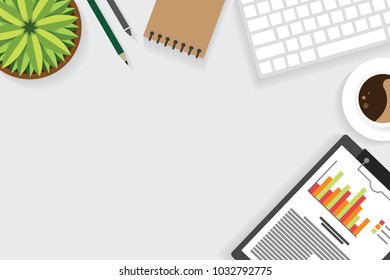 Top view of table working and working desk with gadget and free space for text with accessory on the table, note, keyboard, pencil, flowerpot and coffee cup